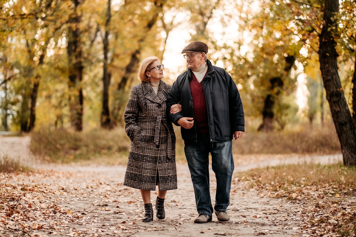 Attractive,And,Happy,Couple,Of,Married,People,Slowly,Walking,Autumn