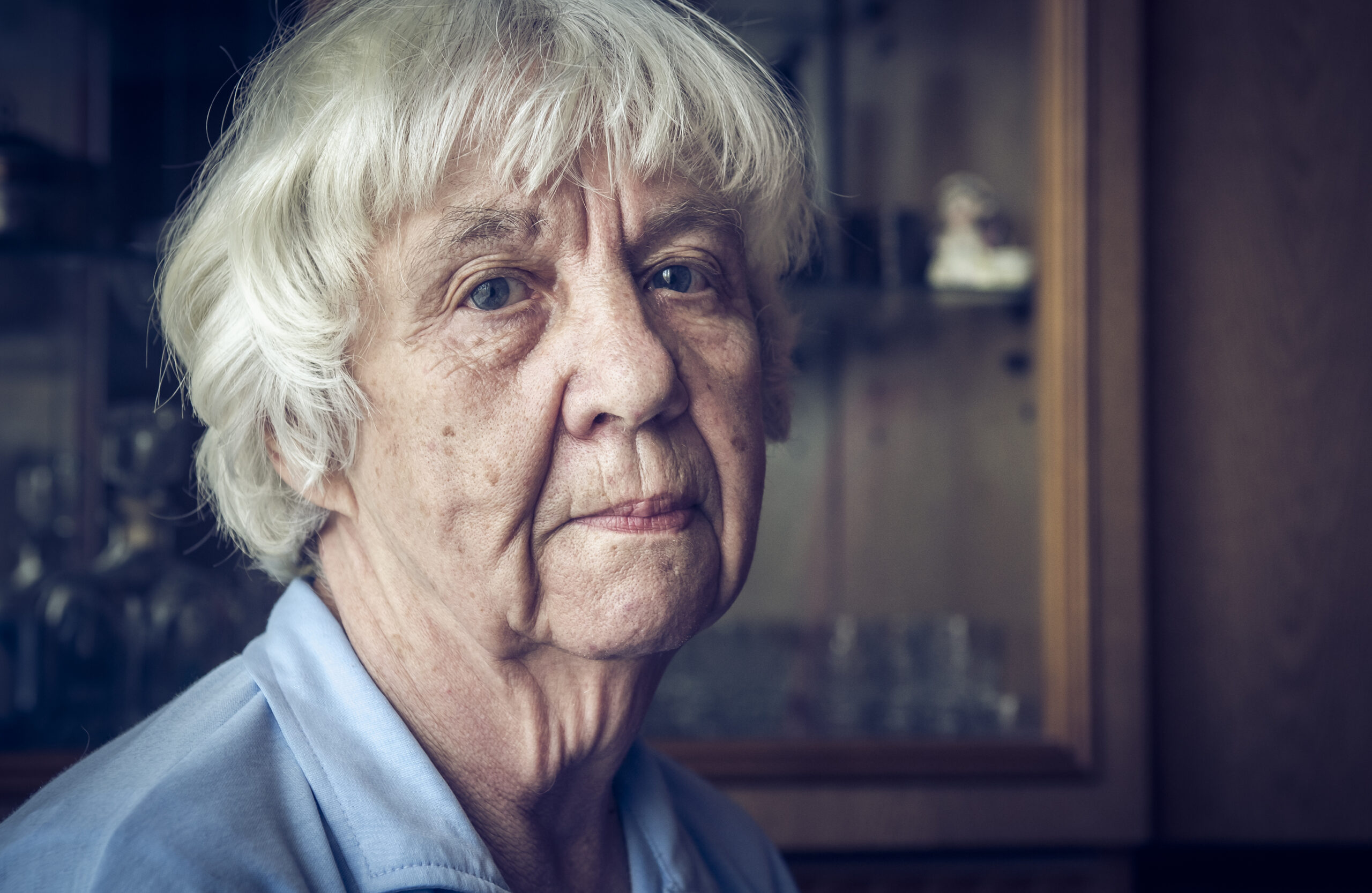 Portrait of a Tired Elderly Woman