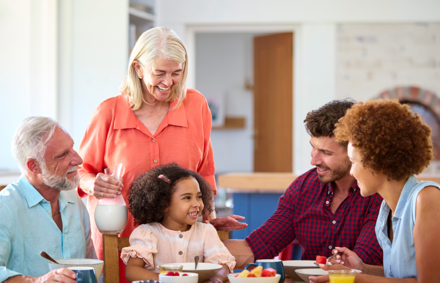 Family reviewing a personalized home care plan with a professional caregiver.