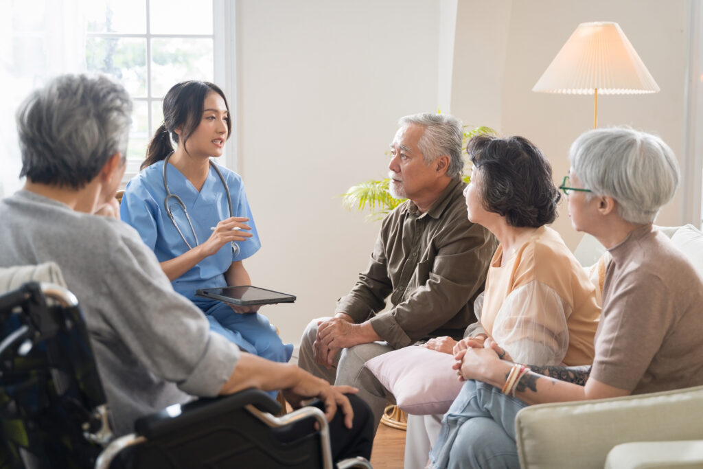 Family reviewing a personalized home care plan with a professional caregiver.