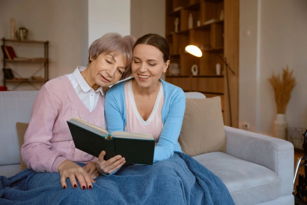 middle age adult woman bonding with her elderly mother